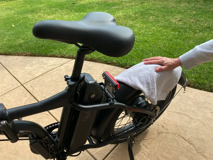 Wipe down your e-bike with a slightly damp rag to clean it before storing it.