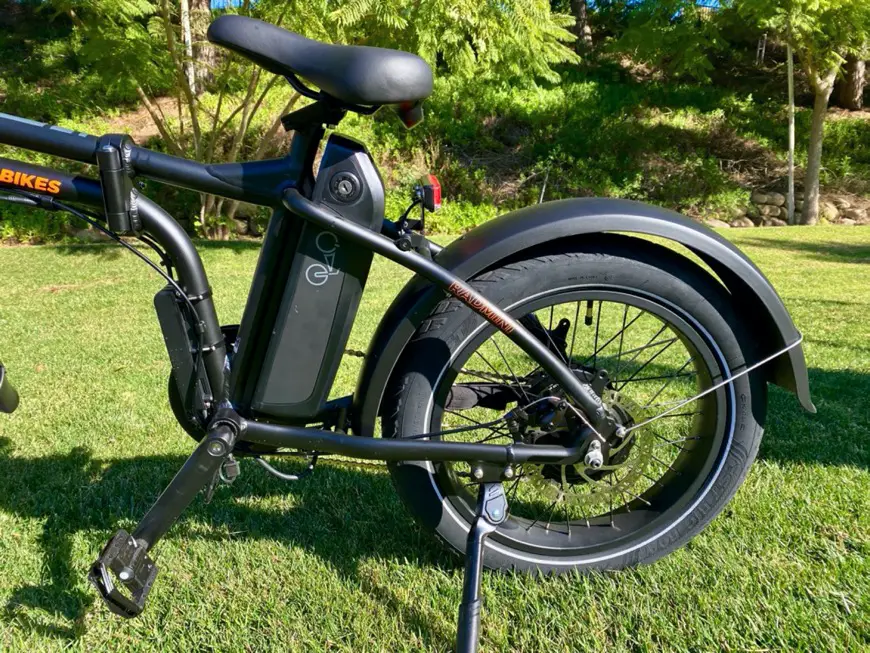 An e-bike battery attached to the center of the bike