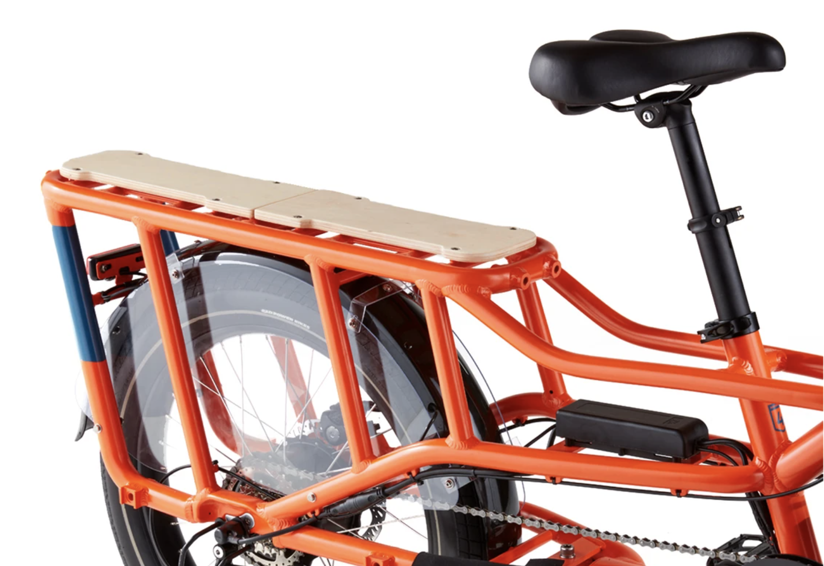 Orange electric bike with rear rack to carry groceries and other items.