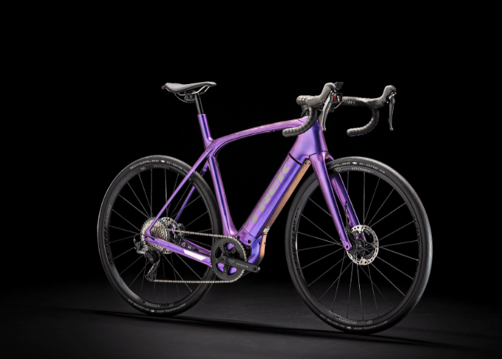 Bright purple Trek e-bike that you can easily hang thanks to its lower weight than other electric bikes