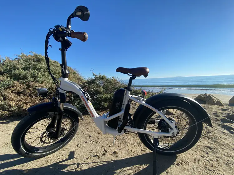 RadMini Step through e-bike on thebeach