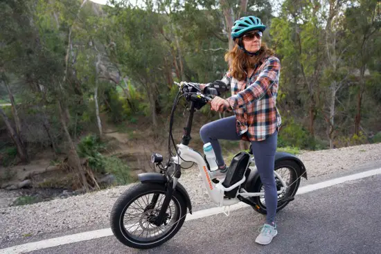 Small Person Riding RadMini Folding Step-Thru E-Bike