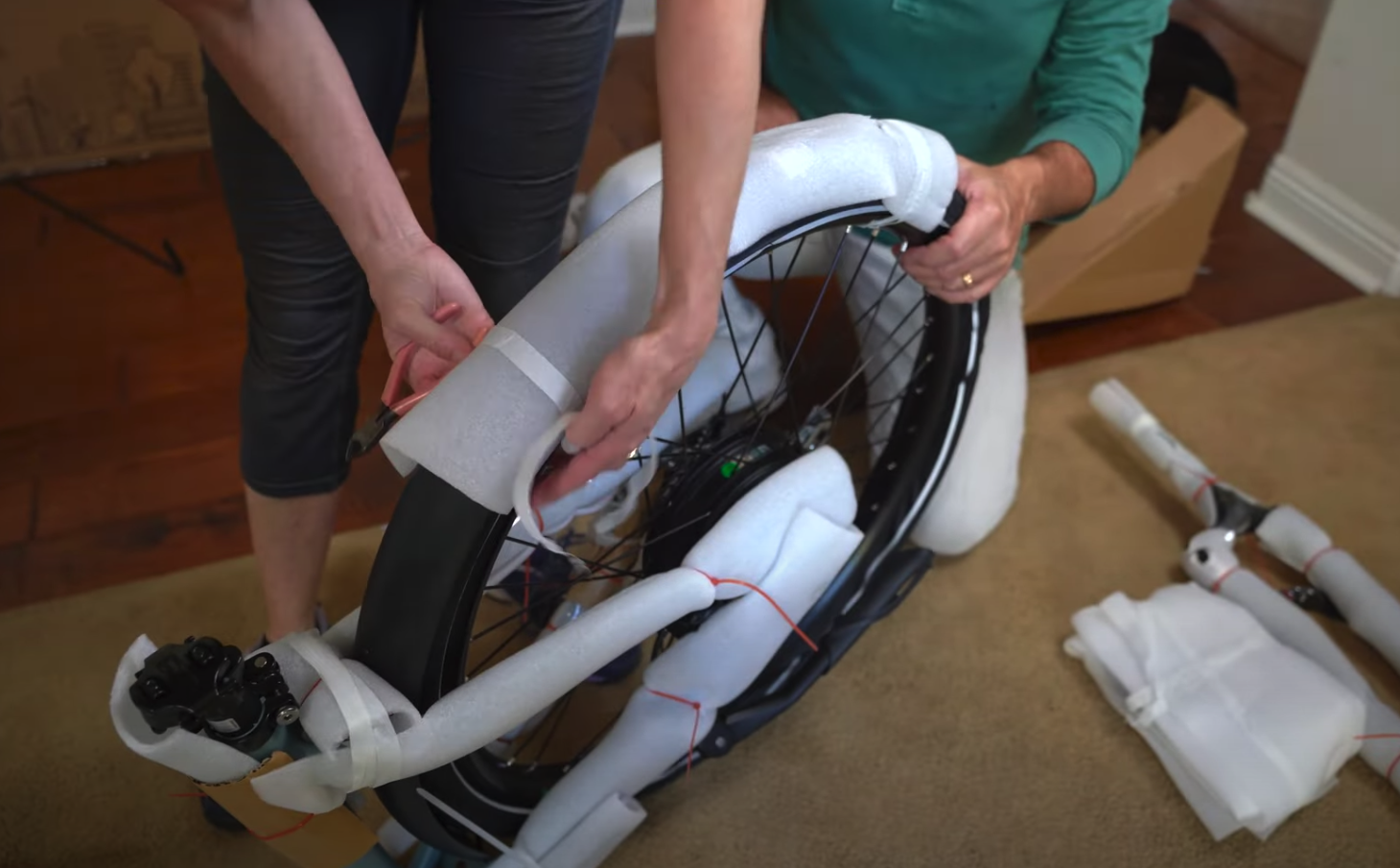 E-bike wheel packaged in styrofoam and tape