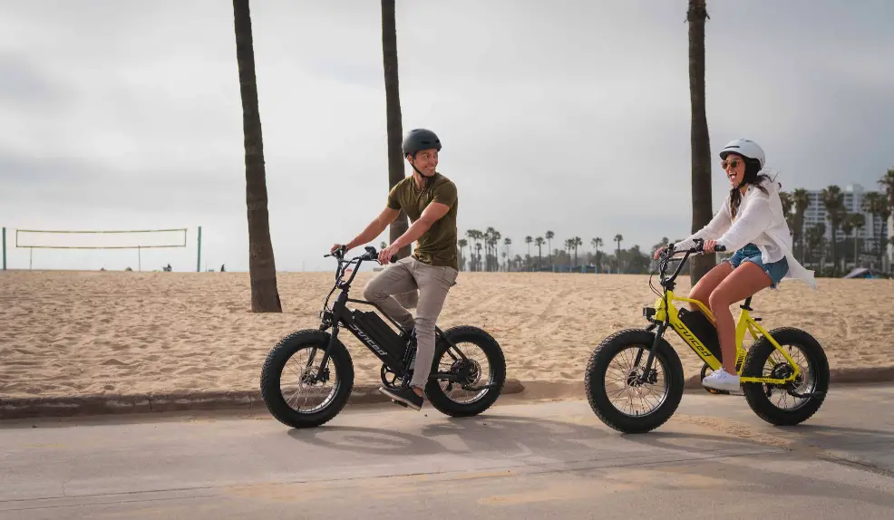 man and woman on Juiced Bikes RipRacer