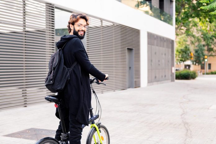 Man riding mini e-bike