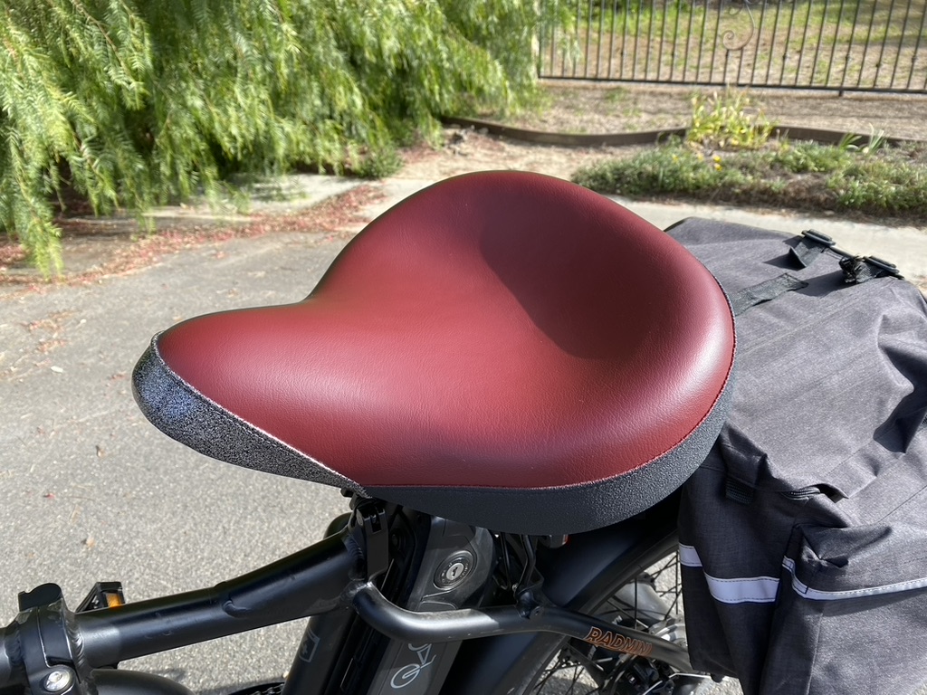 Customized burgundy and black bike seat