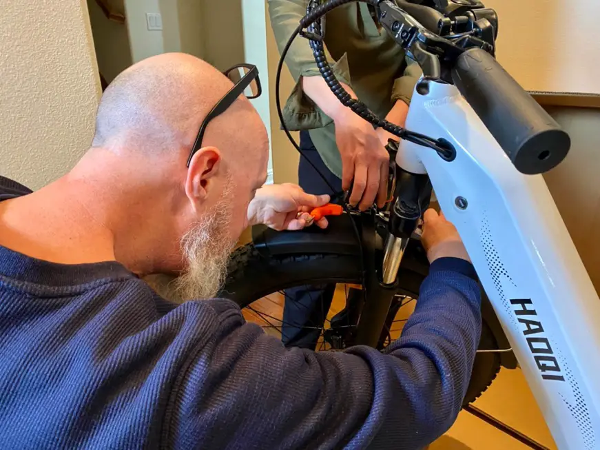 Man assembling electric bike