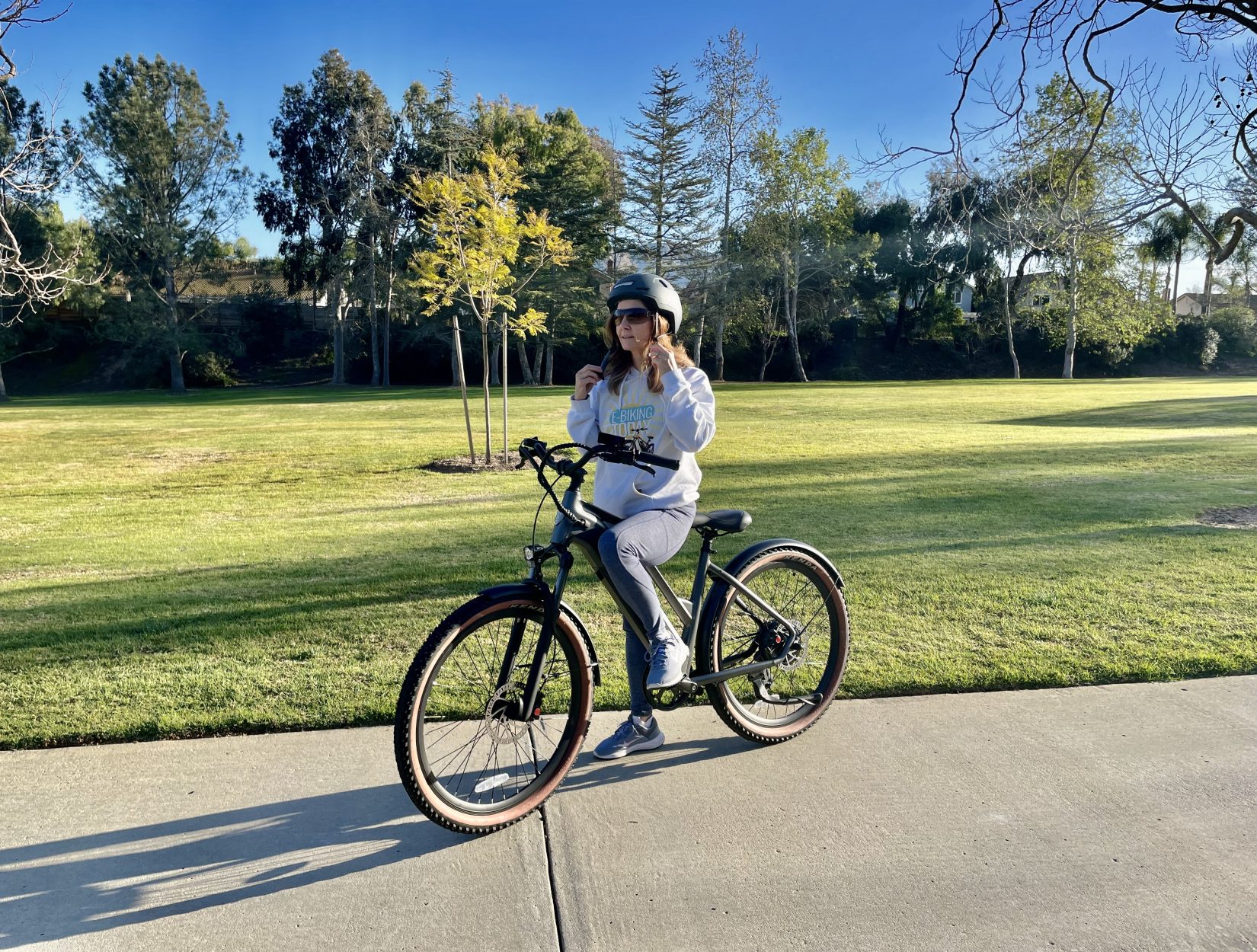 Woman sitting on Ride1Up Turris electric bike
