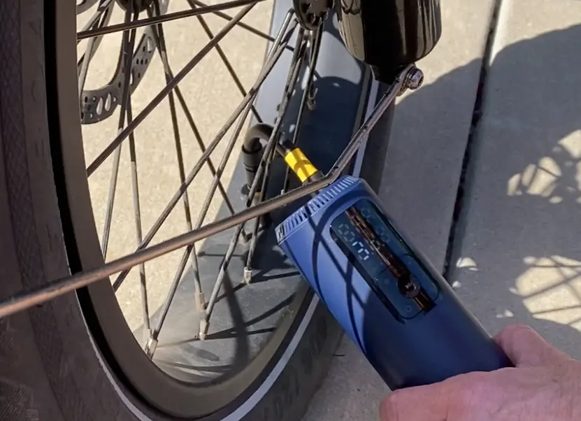 Portable Mini Air Pump inflating flat e-bike tire