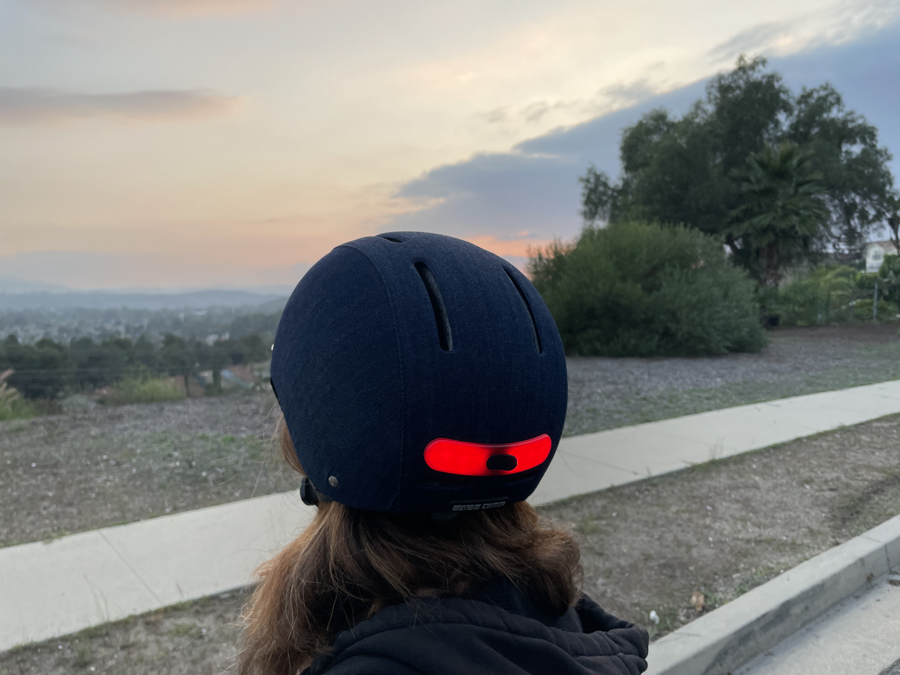 Denim Light up bike helmet on woman's head