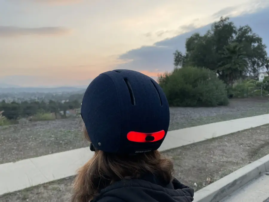 Denim Light up bike helmet on woman's head