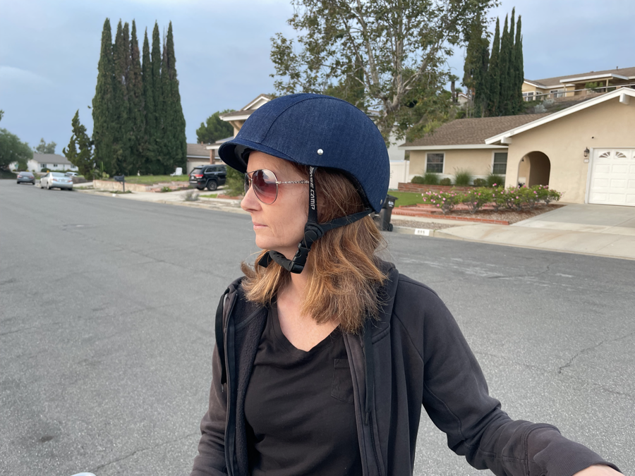 Woman Wearing Urban Style Bike Helmet