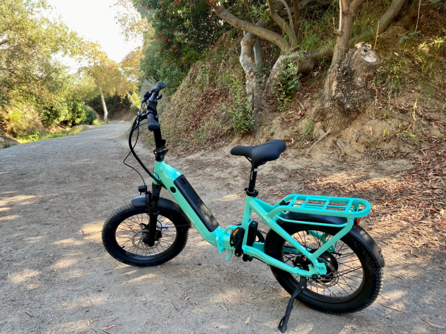 Ride1Up Portola Folding E-Bike on a dirt path