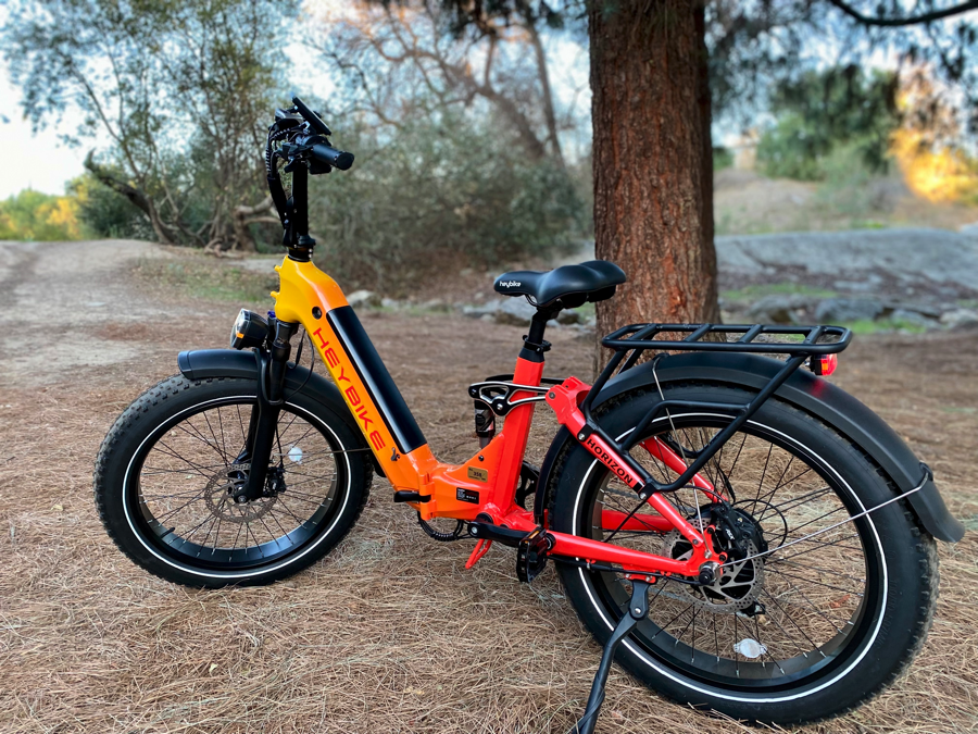 Sunset-colored electric bike in the forest