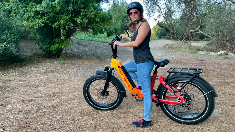 Woman Riding a full-suspension e-bike