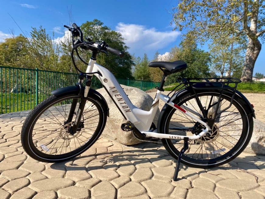 White Aventon Level.2 Electric Bicycle outdoors