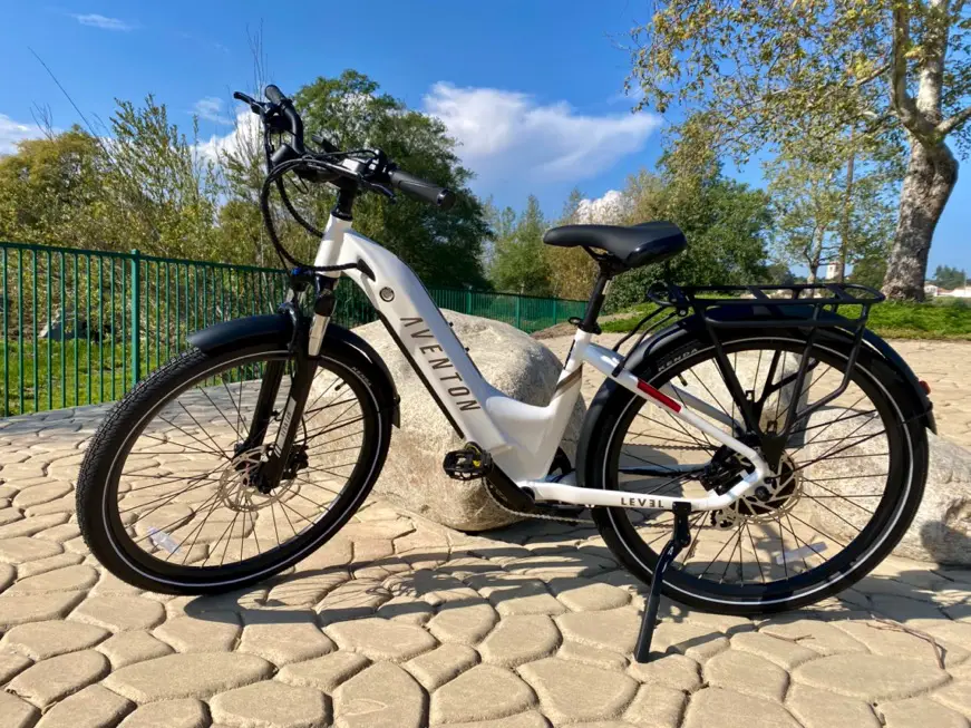 White Aventon Level.2 Electric Bicycle outdoors