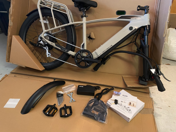 Ride1Up Cafe Cruiser  shown with all parts inside its box