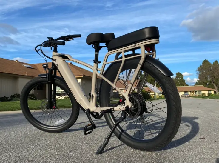 Ride1Up Cafe Cruiser E-Bike standing against the sky